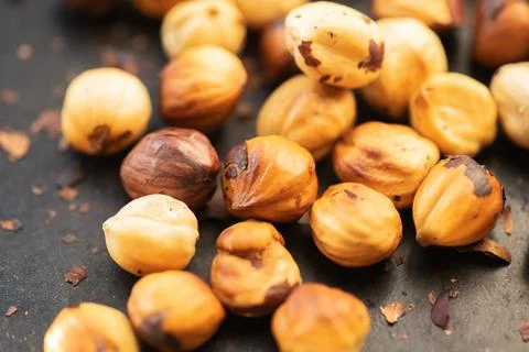 Hazelnuts roasted in an oven. Close up. Stock Photos