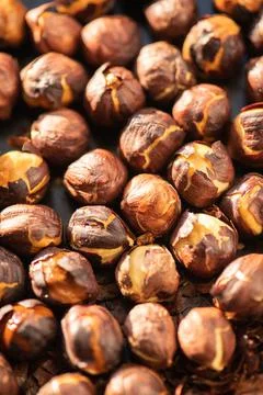 Hazelnuts roasted in an oven. Close up. Stock Photos