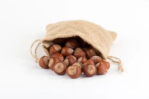 Hazelnuts in sack Stock Photos