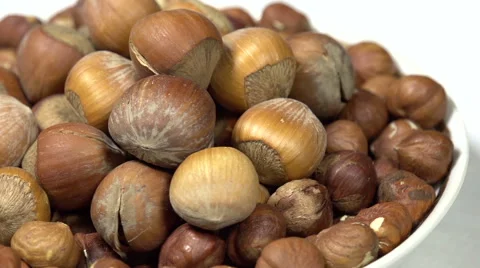 Hazelnuts in the Shell on a Plate Stock Footage 48985542