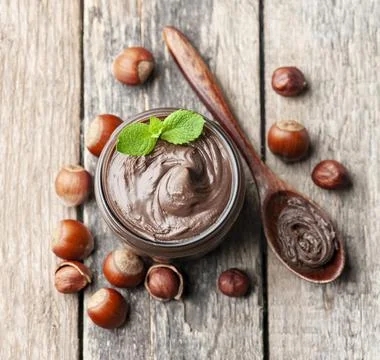 Hazelnuts spread with filbert nuts Stock Photos