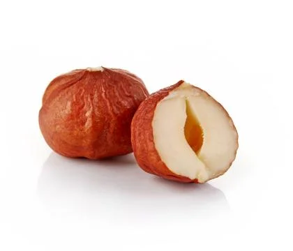 Hazelnuts on white background Stock Photos