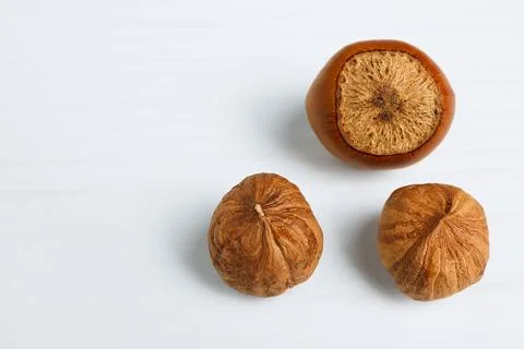 Hazelnuts on a white background. Soft focus. Close-up. Stock Photos