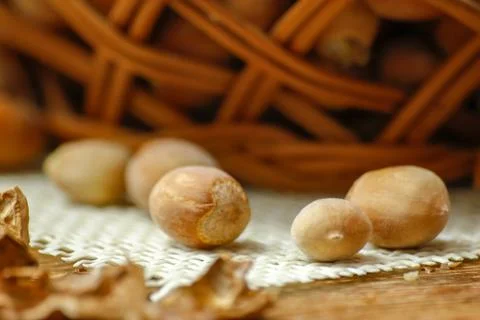 Hazelnuts on wooden table Stock Photos