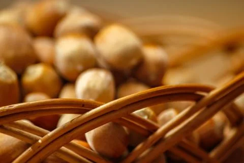 Hazelnuts on wooden table Stock Photos
