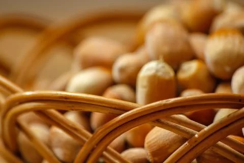 Hazelnuts on wooden table Stock Photos