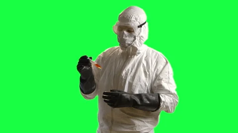 Hazmat doctor looking at a sample green screen 動画素材 42312469