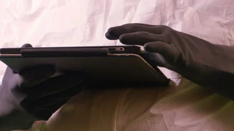 Hazmat suit with person using Smart tablet scanning information doctor pandemic  Stock Footage 234592756