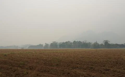 Hazy Border Mountain Range Under Smoke Blanket Stock Photos