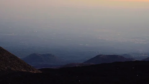 Hazy City below Mount Etna Stock Footage 88571909
