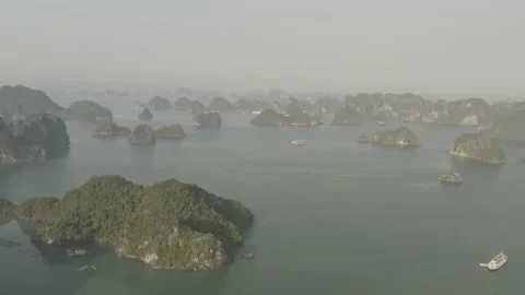 Hazy Flying over Mountainous Bay Region, Southeast Asia, Vietnam 4K Stock Footage 203452634