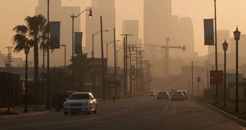 Hazy red sunset over the downtown los angeles skyline Stock Footage 87364795