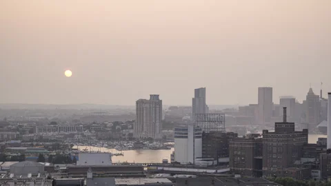 Hazy Sunset Over Baltimore Timelapse Video stock 157564230
