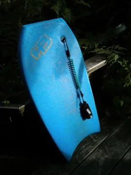 HB bodyboard in backyard Stock Photos