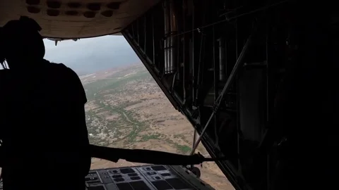 HC-130P King aircrew perform a static line jump Stock Footage 75985341