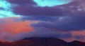 HD 1080p super color - cloud pocket stuck on mountain peak time lapse HD Footage