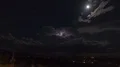 HD 24p lightning storm cell under the moon time lapse wide HD 影片