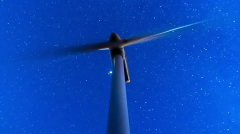 HD 25p wind mill turbines site on mountain timelapse with stars galaxy sky Stock Footage 61484422