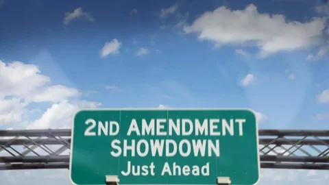 HD - 2nd Amendment Showdown (Gun Control) road sign Stock Footage 113830189