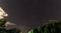 HD 30p Starry sky night clouds move in and out in time lapse HD Footage