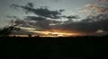 HD 30p wide - The clouds move just before revealing the sunset HD Footage