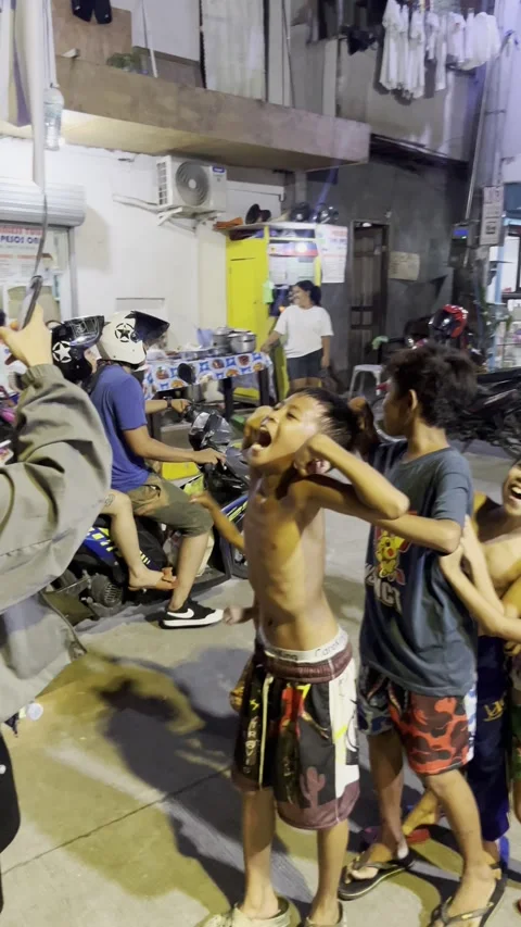 HD | 4K Children Playing On Night Street In The Philippines Stock Footage 338240671