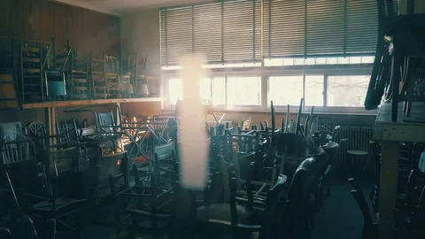 HD 60p Slow Motion - Closed School Classroom Chairs Stacked Up Stock Footage 128934445