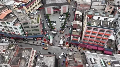 HD Aerial Top-Down View of Pedestrians and Traffic at a Small Town Intersect Video stock 328487936