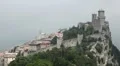 HD Aerial View of San Marino, Guaita Tower, Morning Fog, Castle, Old Town Hall HD Footage