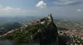HD Aerial View of San Marino, Guaita Tower, Morning Fog, Castle, Old Town Hall HD Footage