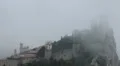 HD Aerial View of San Marino, Guaita Tower, Morning Fog, Castle, Old Town Hall HD Footage