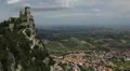 HD Aerial View of San Marino, Guaita Tower, Morning Fog, Castle, Old Town Hall HD Footage