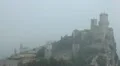 HD Aerial View of San Marino, Guaita Tower, Morning Fog, Castle, Old Town Hall HD Footage