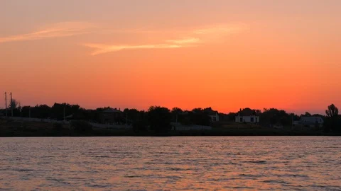 HD Amazing sunset over the river of the city. The red sky Stock-Footage 94445704
