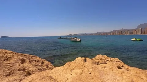 HD Beach with boats, waves, ocean views Stock Footage 194240448