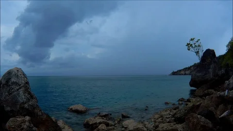 HD BEACH TIMELAPSE DARK CLOUDS AND CALM WATER Video stock 91315229