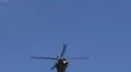 HD blackhawk flyover tracking passes the sun overhead w sound closeup HD Footage