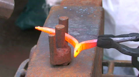 HD Blacksmith working with metal by old fashioned way, with hammer and anvil, cl Stock Footage 636850
