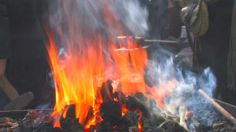 HD Blacksmiths are working in blacksmith show, forge foreground Stock Footage 636872