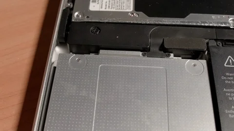 HD bolt up a hard disc inside Mac Book Stock-Footage 94450344