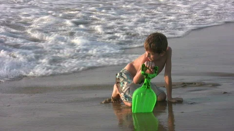 HD boy playing at the beach Stock Footage 157541