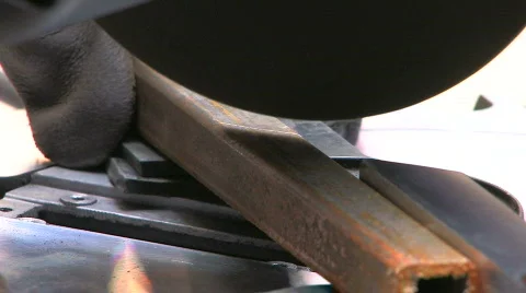 HD Circular saw blade teeth coming through metall, closeup Stock Footage 611794