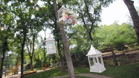 HD CLoseup shot of lattern which decorate the tree on the wedding yard Stock-Footage 94446991