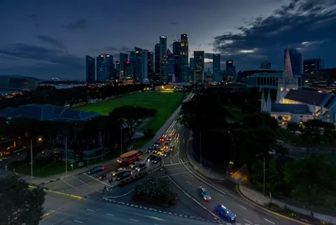 HD Cloudy Evening to Night Timelapse : Singapore Skyline Stock Footage 149346012