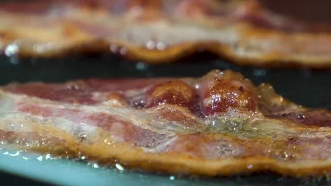 HD | Cooking Bacon in Slow Motion Stock Footage 76708648