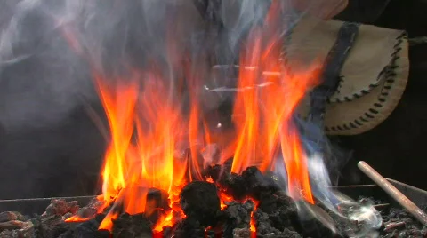 HD Demonstration of blacksmith craft, forge foreground Stock Footage 636878