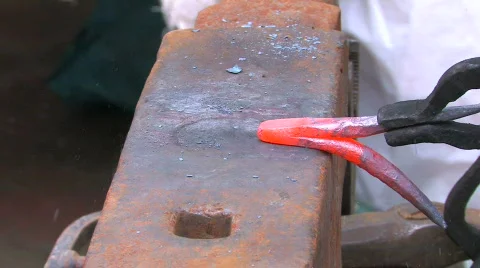 HD Demonstration of blacksmith skill, with hammer and anvil, closeup Stock Footage 636840