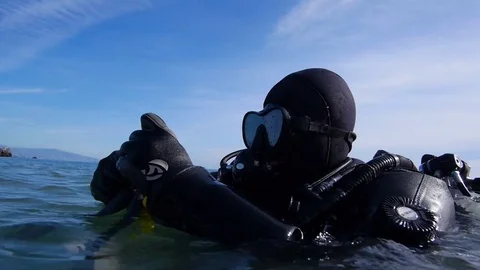 HD Diver preparing the measuring equipment before the dive Stock Footage 82619741