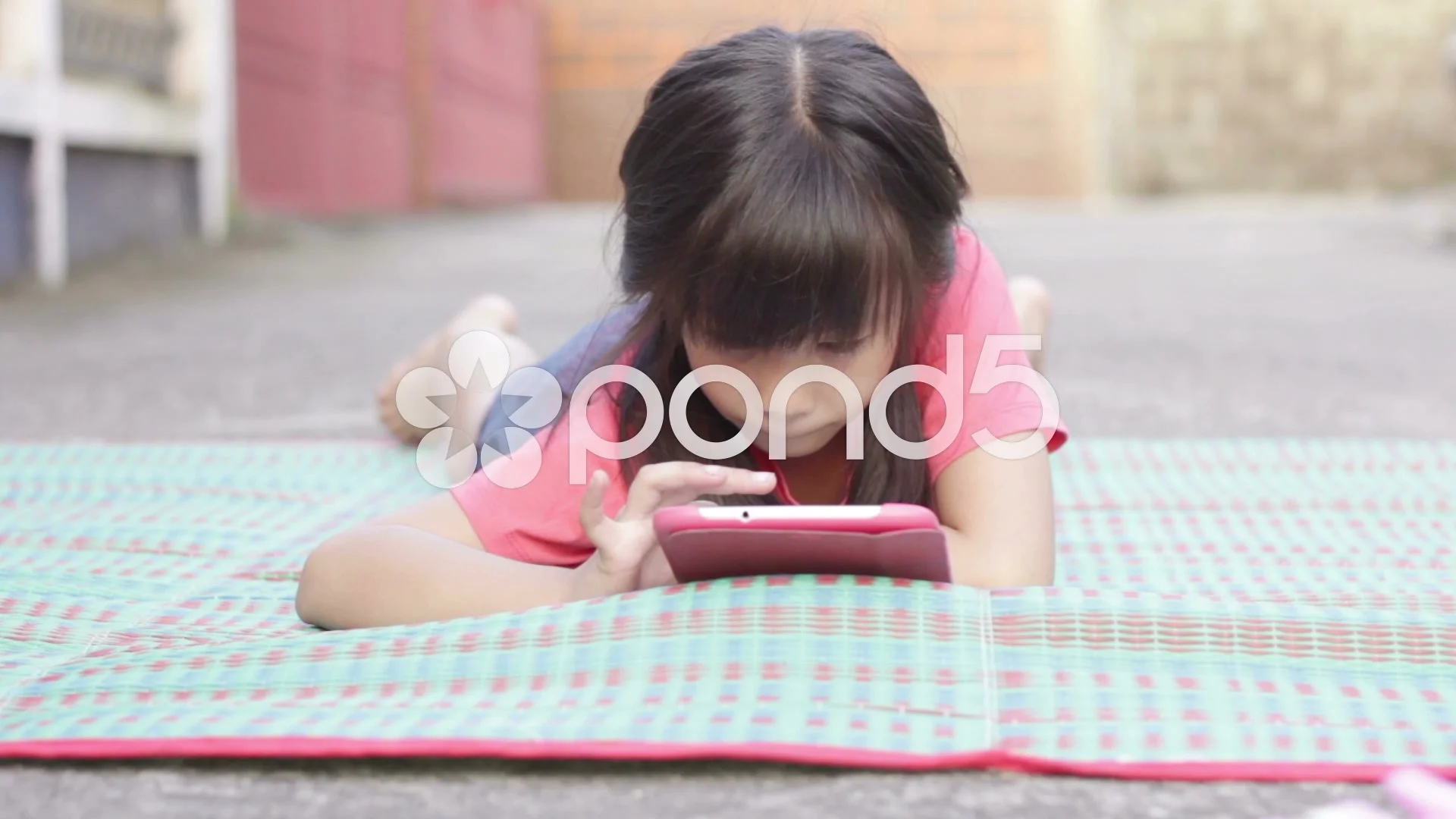 HD Dolly: Little Asian girl touching tablet computer surface touchscreen  ipad