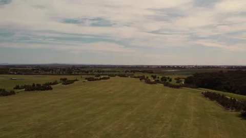 HD Drone shot of flying over a field Stock Footage 163186095